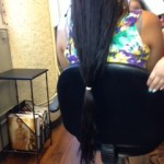Ten inches of hula hair banned together to get cut and donated.