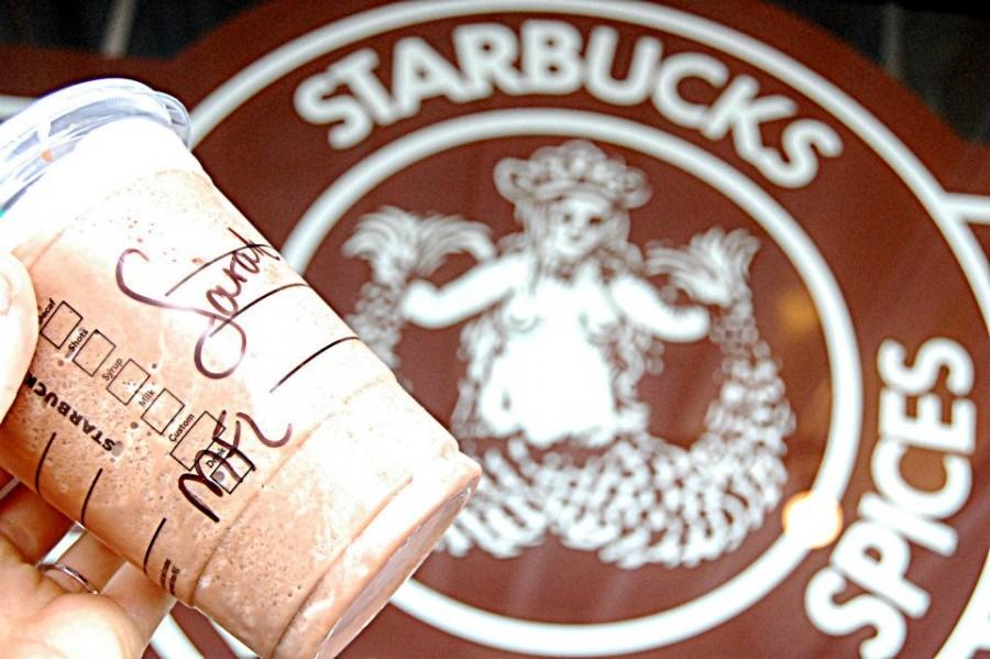 The first Starbucks sign, with your own personal cup.