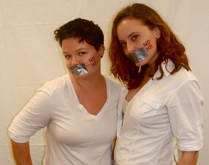 Students Alex Davis and Mckenzie Hoover silently protesting during the NOH8 campaign. Photo courtesy to Suse Sampaio Simoes.