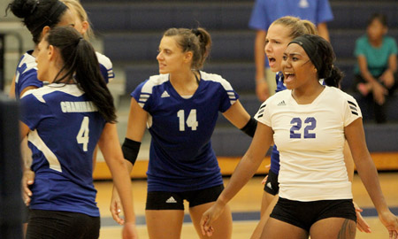 Lady Swords celebrate after a point