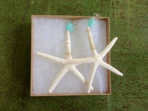 The large white starfish earrings are the signature piece of Aydee by the Sea. Photo Credit: Melanie Schumilas