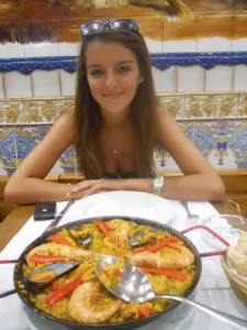 Bucher dining in Madrid, Spain eating one of it's popular traditional dish called the Paella. 