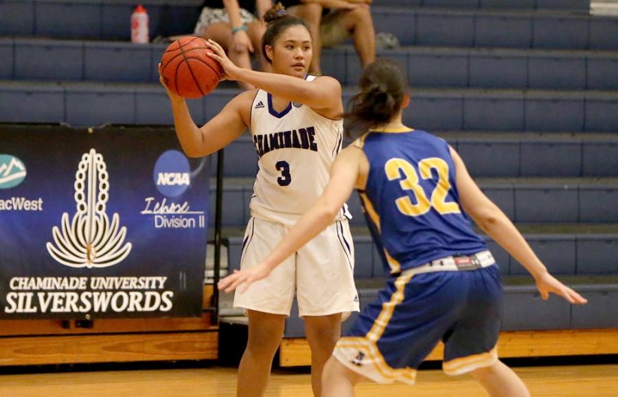 Junior forward, Courtney Kaupu looking for a teammate to feed the ball and get to the hoop.