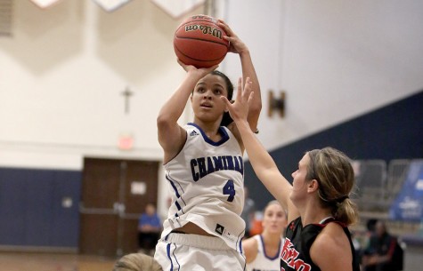 In a game where height is beneficial, starting point guard Kristle Henry, 5-foot-7 shines with her athleticism and speed. 