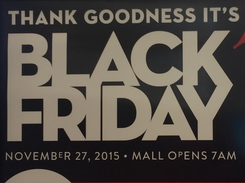 Flyers+and+schedules+regarding+Black+Friday+were+posted+all+around+Kahala+Mall+for+customers+to+see.+