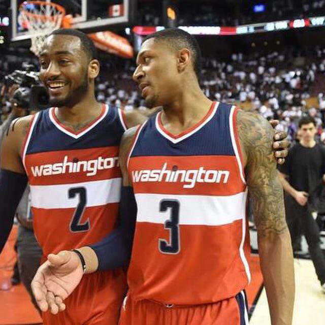 John Wall (left) looks to improve his jumpshot to solidify himself as a top point guard in the NBA