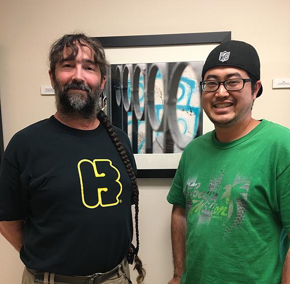 Professor Tom Galli and senior Grant Okazaki, the producers of Hookūkū Hawaii, the first live Hawaiian trivia show that Chaminade is producing.