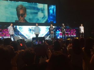 Big Bang kicks off their show with each member greeting the audience.