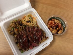 The original steak plate along side torched dynamite ahi poke. 