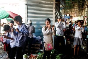 Jen May's students use their photography skills in a Cambodian Market. 