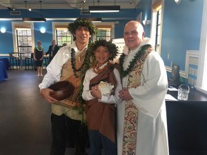 Kumu Keahi, Logan Henderson, and Father George Cerniglia join together after the private blessing