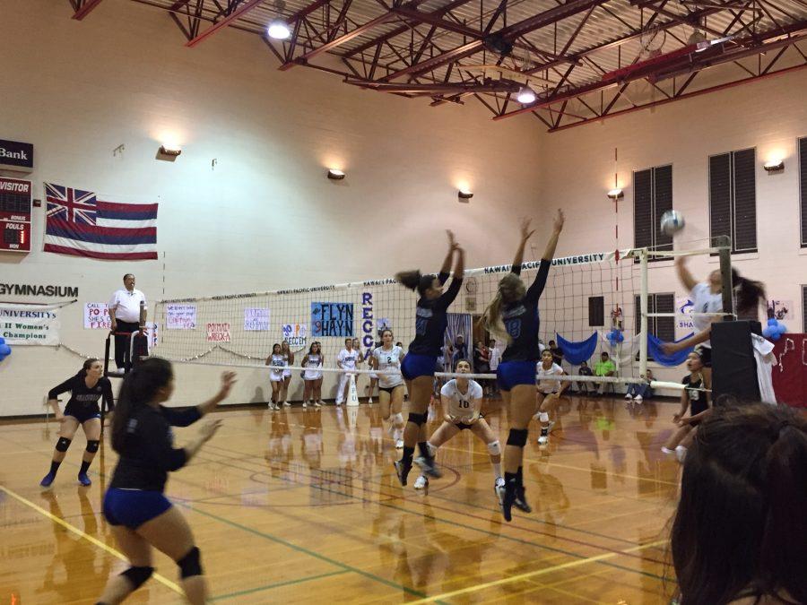The Silverswords vollyball team in action against rival Hawaii Pacific University