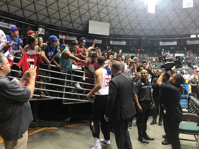 Blake Griffin gives his shoes away to fans at Tuesdays game.