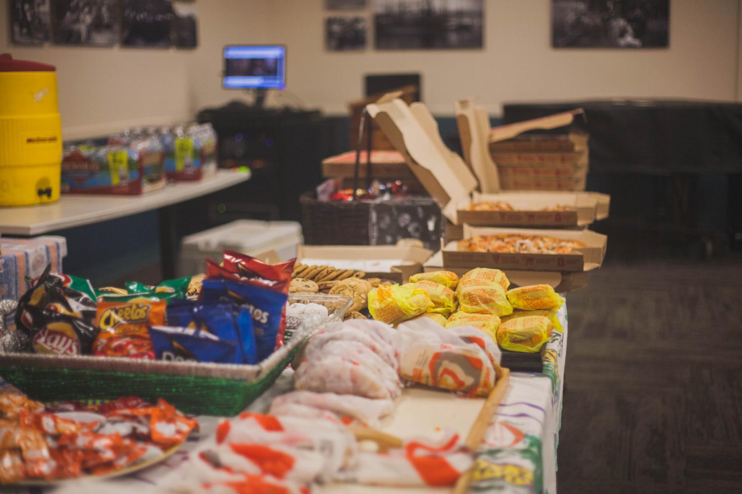 30 cheeseburgers, 30 tacos and 20 boxes of pizza filled the Clarence T.C. Ching Hall in Eiben for Munchie Mania