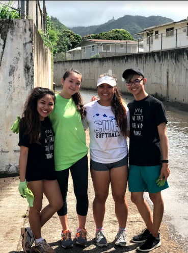 Club members, (from left to right) Angelica Concepcion, Robyn Keith, Rainelle Matsuoka, and Dalton Alatan volunteered to help clean up around the Palolo neighborhood. 