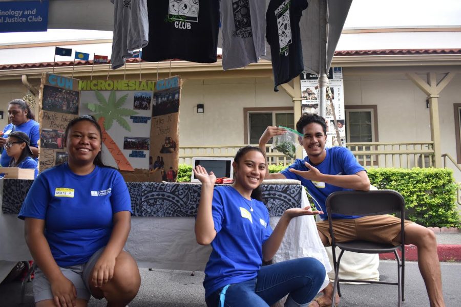 Students Mary Anton, Sisca Aaron, Kobe Ngirailemesang (from left to right) who are all members of Chaminades Micronesian Club, helped at Preview Day on Saturday by sharing information to interested high school students about the club.