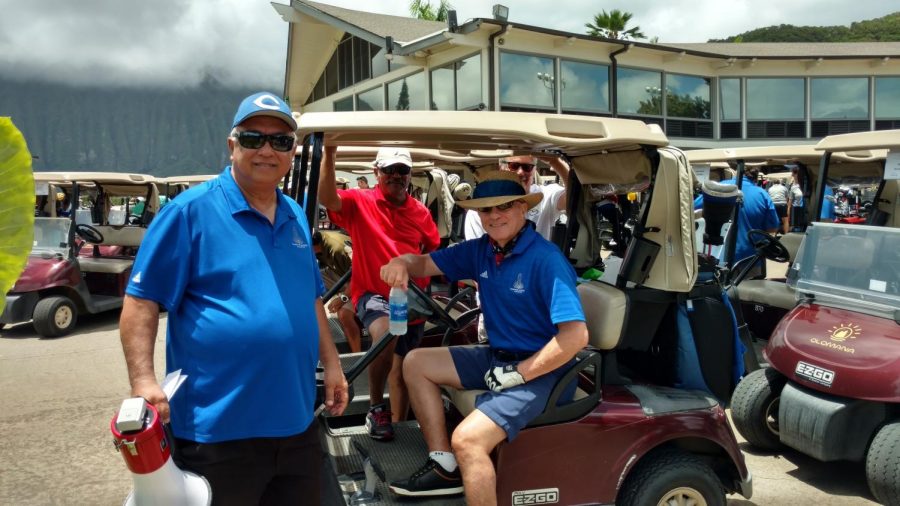 Bill Villa at the annual Chaminade University Athletics golf tournament at Olamana with Chaminade Board of Regent Vaughn Vasconcellos.