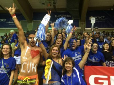 CUH students cheering on the basketball team at the Maui Invitational in 2015 at Lahaina Civic Center. 