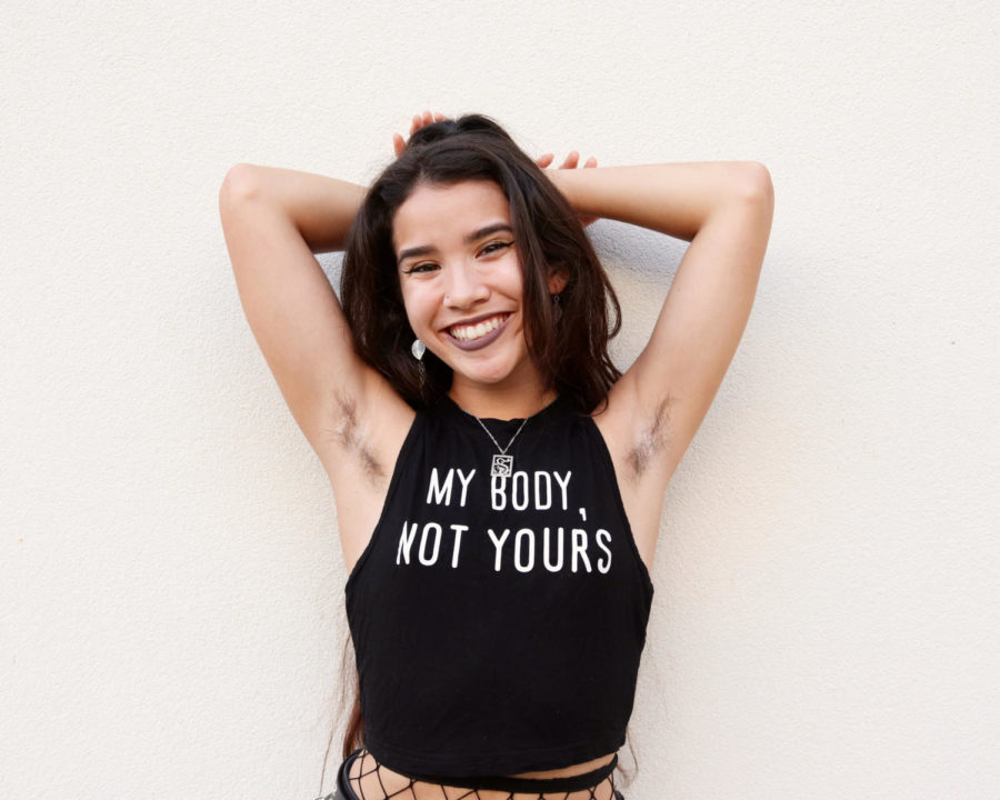 Staff Writer Eri Leong proudly displays her armpit hair to promote body positivity and body autonomy among women. 