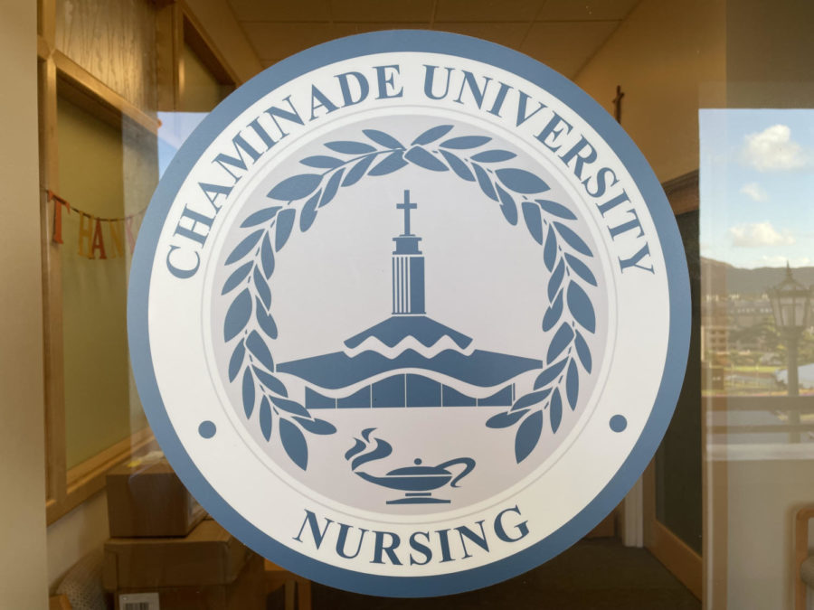 The Chaminade University Nursing emblem is displayed in the faculty nursing office of Henry Hall. 