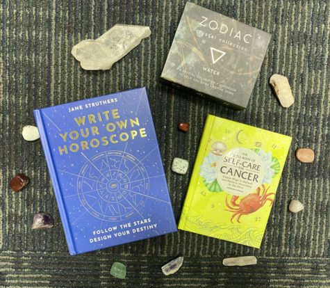 Astrology books and crystals lay scattered around staff writer Eri Leongs room, as theyve grown to be pieces of her belief in astrology. 