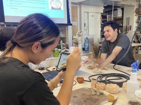 Students in Intro to Ceramics enjoying their class with no mask.