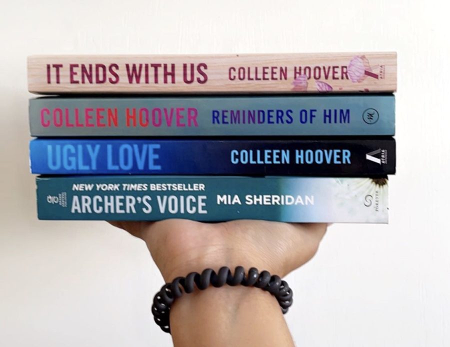 The newest additions to my book collection. Going out of my comfort zone and indulging in Colleen Hoover books. 