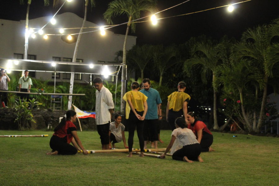 Chaminade Universitys Filipino Club performs traditional Tinikling dance at 2022 Pacific Island Review. 