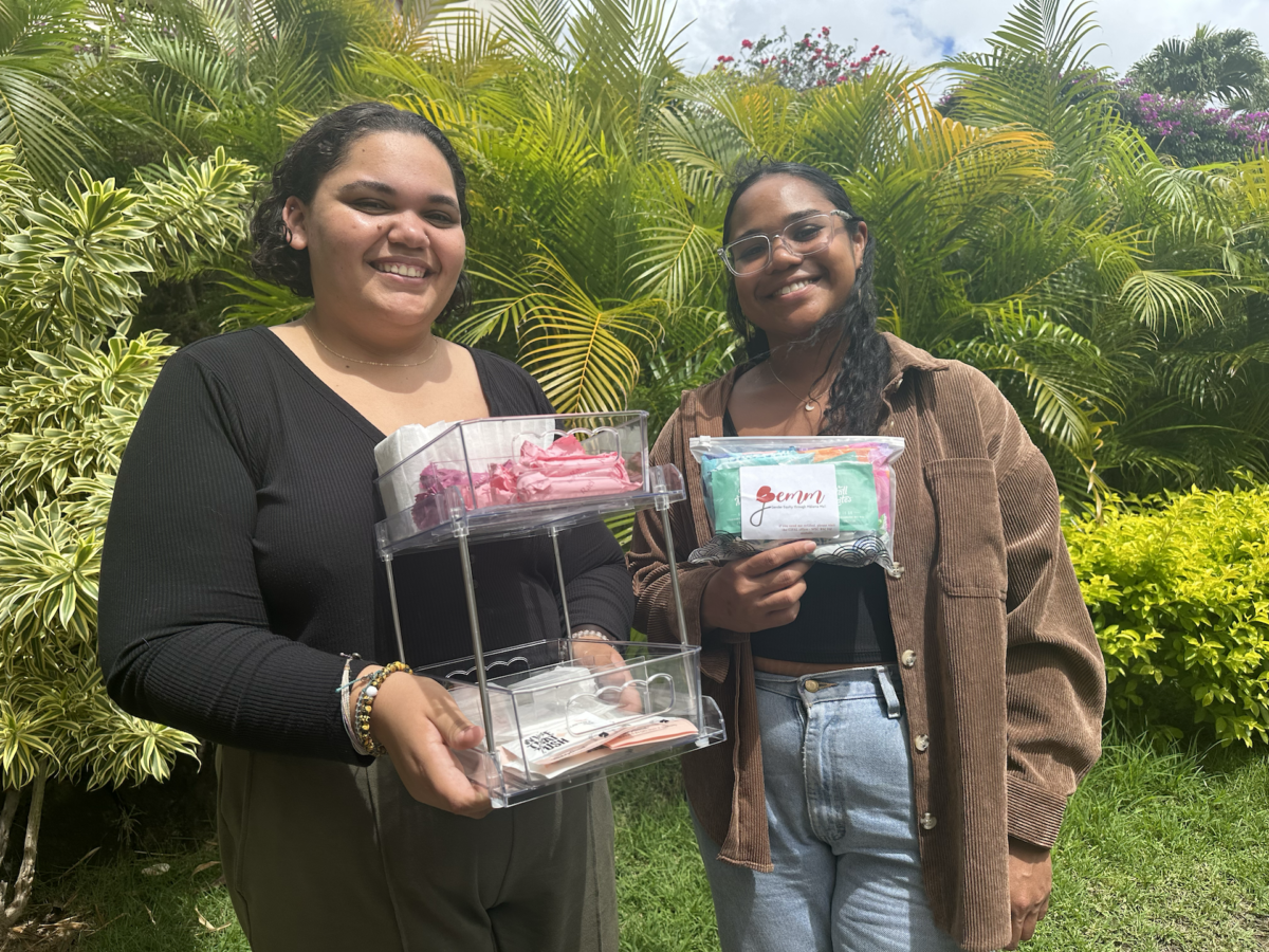 GEMM directors Aleeyah Lemons (left) and Rhea Jose (right) began placing menstruation stations around campus on the first day of the Fall 2023 semester.  (Photo by Noelani Tugaoen)