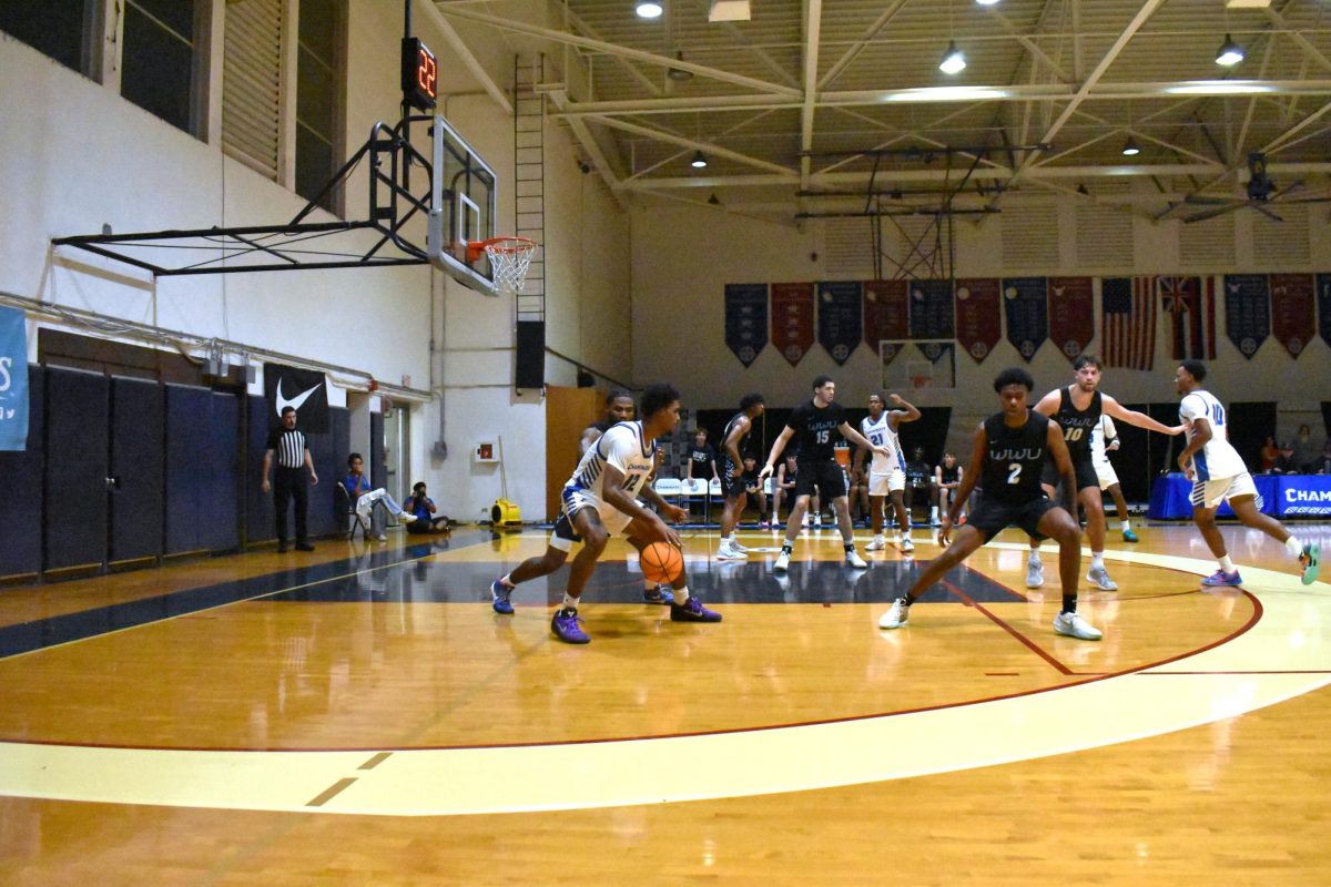 Guard Kris King backs down his defender for a floater in Wednesday's game. 