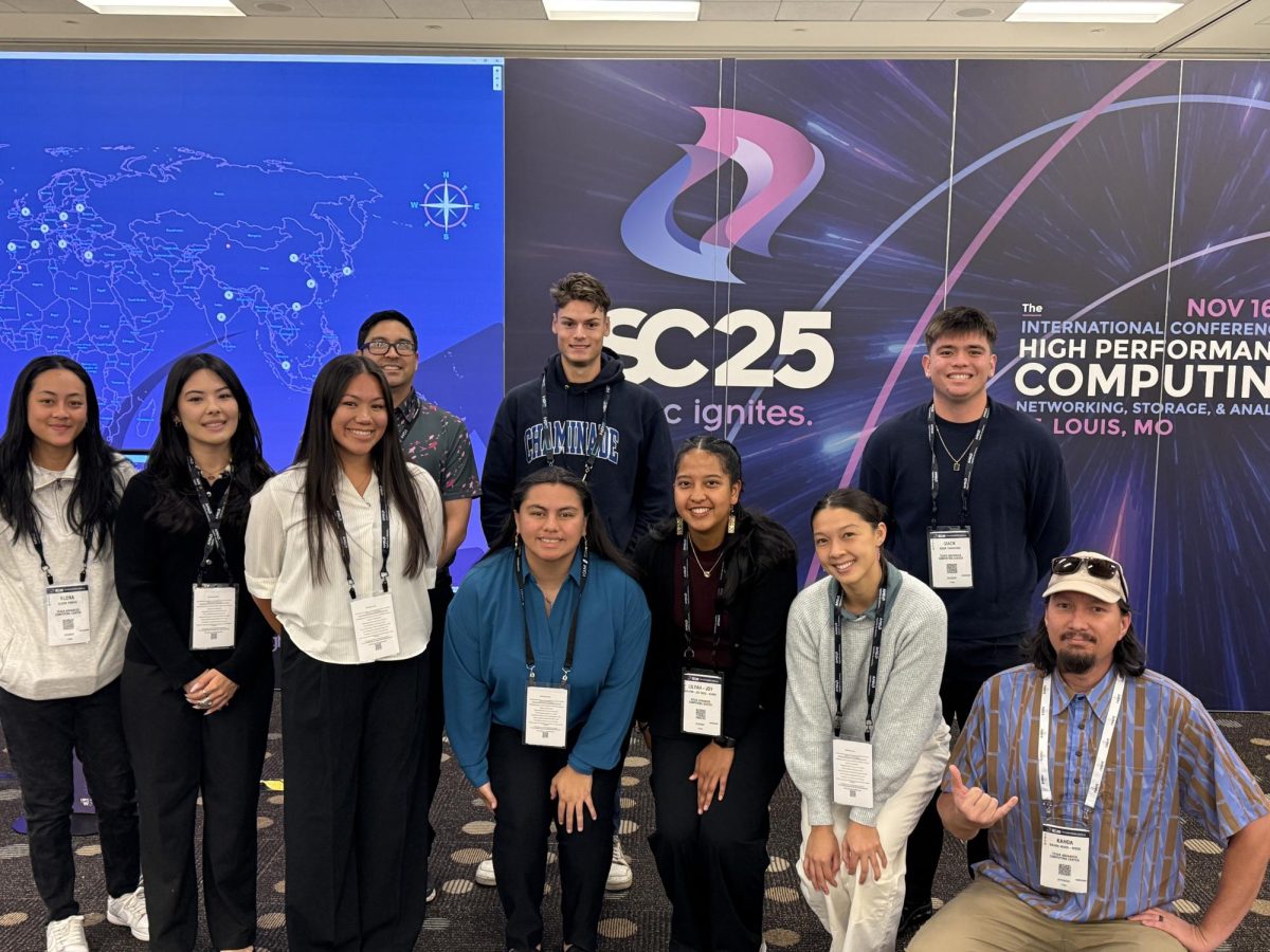 Seven Chaminade students, mentor Liliyah Quel-Kaina (front row, third from the right), and professors Rylan Chong and Kahoa Keahi-Wood traveled to St. Louis to participate in a research conference in November. 