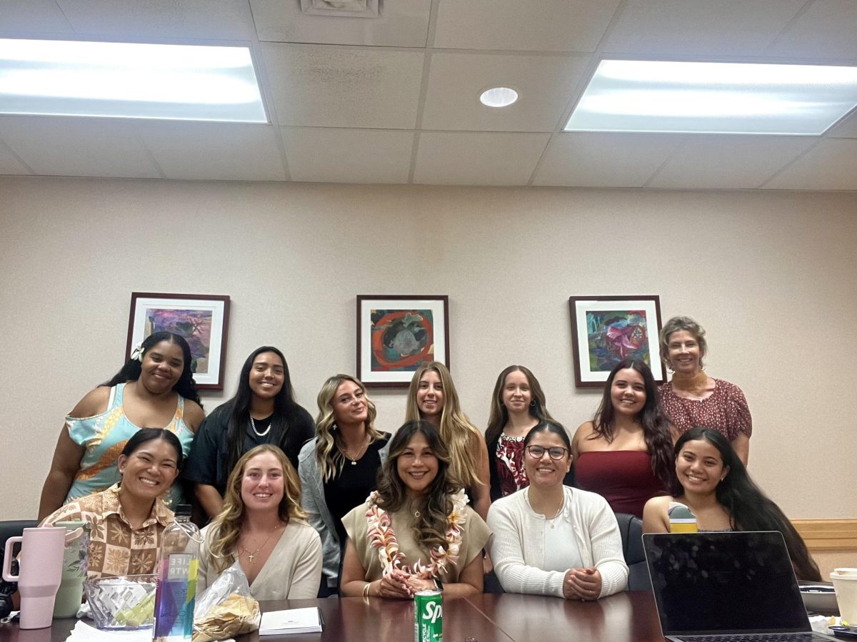 WILD met Dean Annette Santos (front row and center, with a lei) from the Chaminade School of Business and Communications at the first meeting of the year in October. 