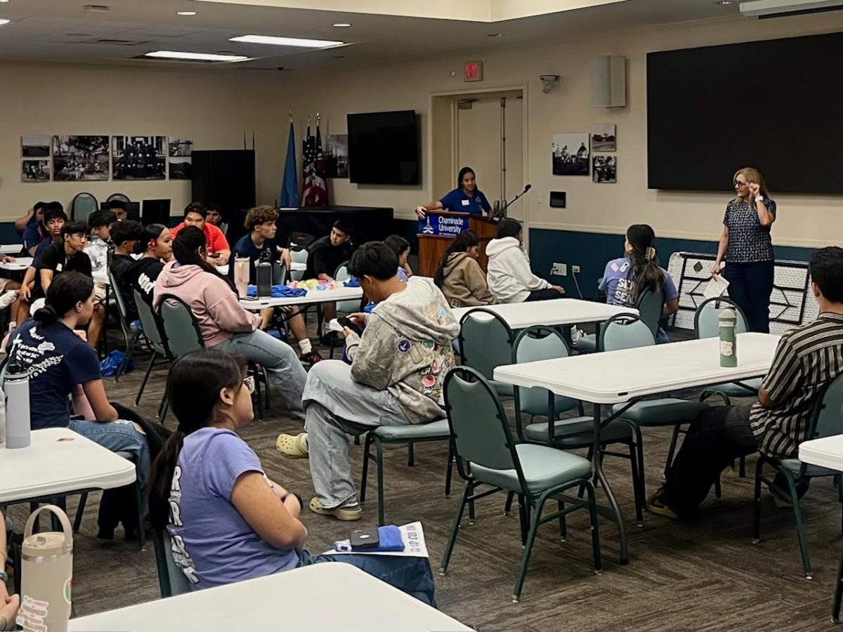 Early College Program students gathering at closing ceremony as they reflect on everything they've learned throughout the program and the summit.